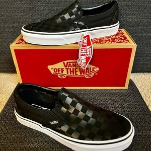 Vans black checkerboard slip on